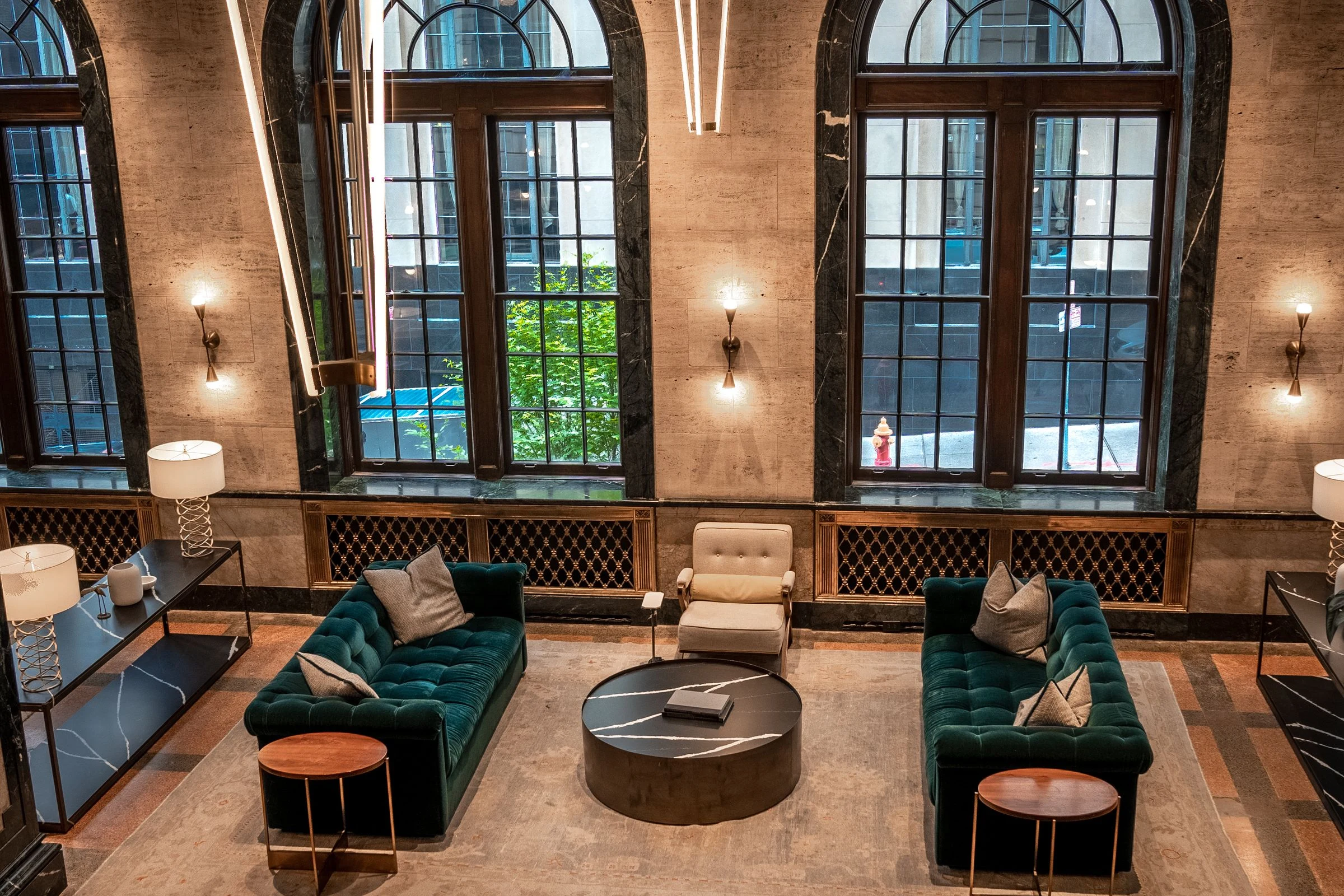 Hotel lobby with lounge seating and large windows